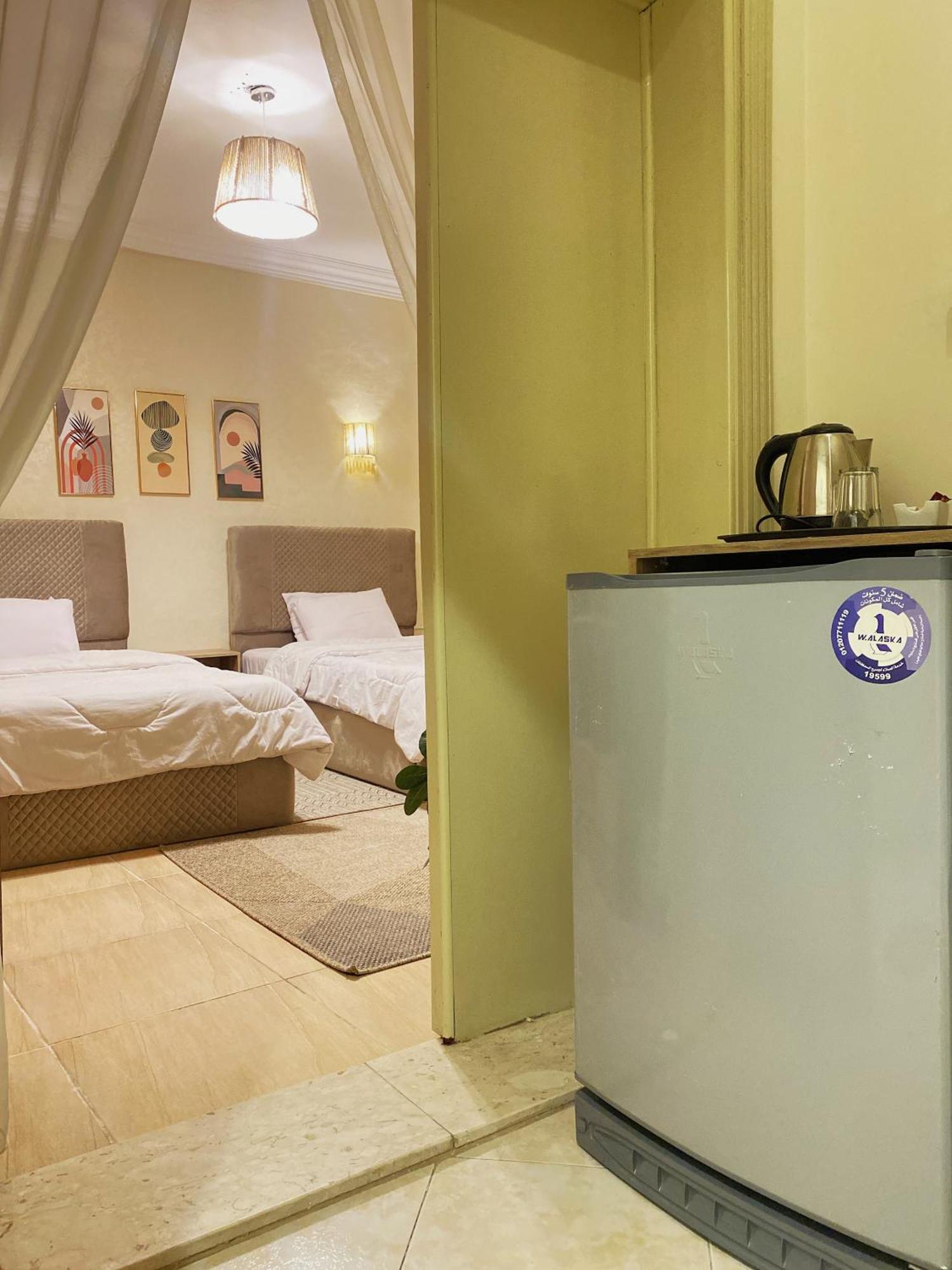 Seven Pyramids Panoramic View Inn Kafret el-Gabal Chambre photo